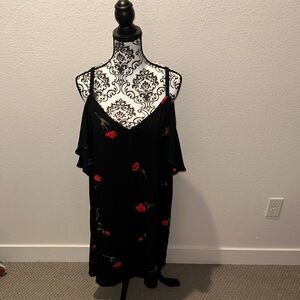Black Sleeveless Dress with Embellished Front Design